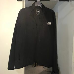 Men’s north face zip up jacket.